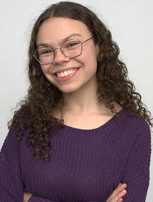 IMAGE #26 – headshot, student actor in purple sweater copy